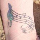 Music Notes on a Staff Tattoo