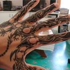 Detailed Tribal Hand Tattoo