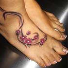 Cherry Blossom Tribal Foot Tattoo