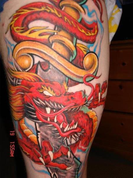 red asian dragon dagger tattoo Red Asian Dragon with Dagger Tattoo