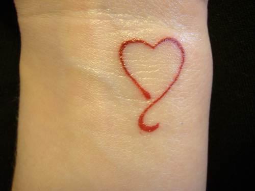 small delicate red heart wrist tattoo Small Delicate Red Heart Wrist Tattoo