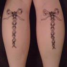 Laced Up Bow Tattoos