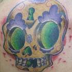 Yellow Purple Green Sugar Skull Tattoo
