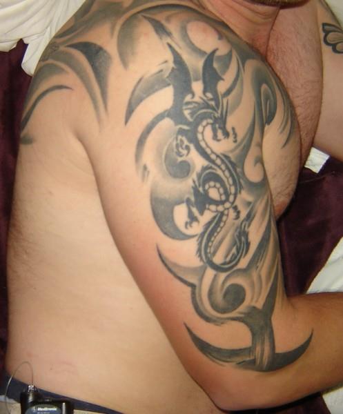 tribal dragon infusion tattoo 497x600 Tribal Dragon with Infusion
