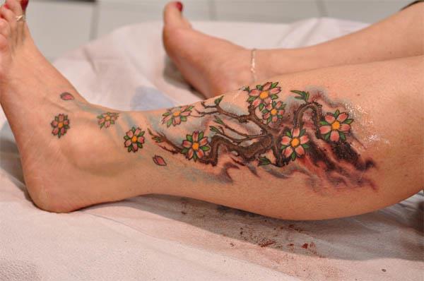 cherry blossom branch calf tattoo Cherry Blossom Branch Calf Tattoo