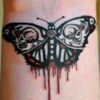 Evil Moth Tattoo