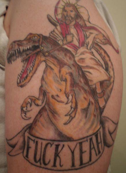 jesus riding a dinosaur tattoo OMG! WTF Jesus Tattoos